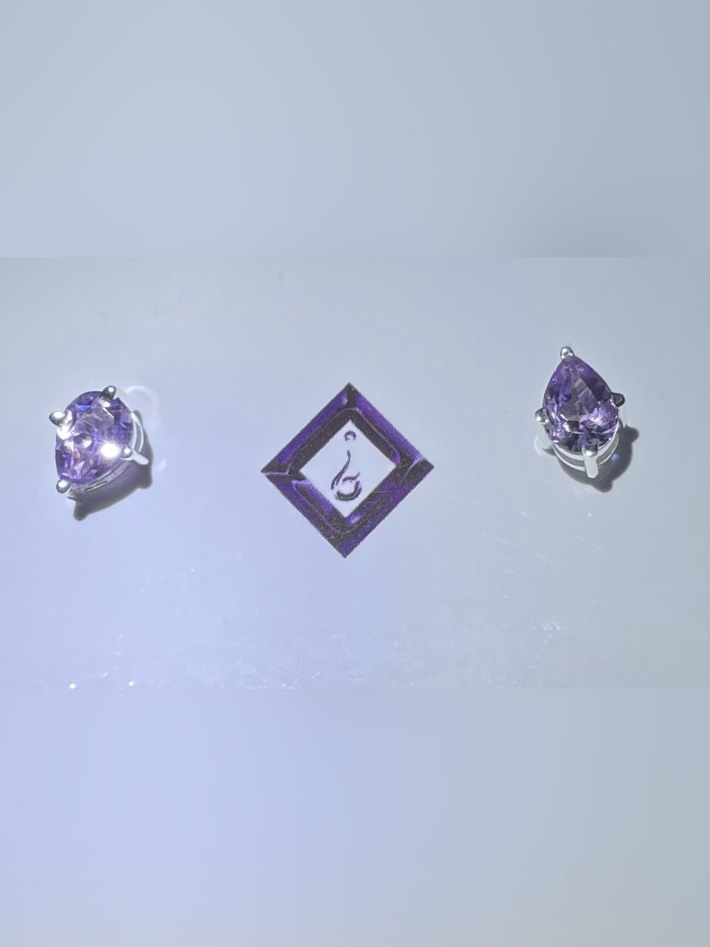 Amethyst pear-shaped studs